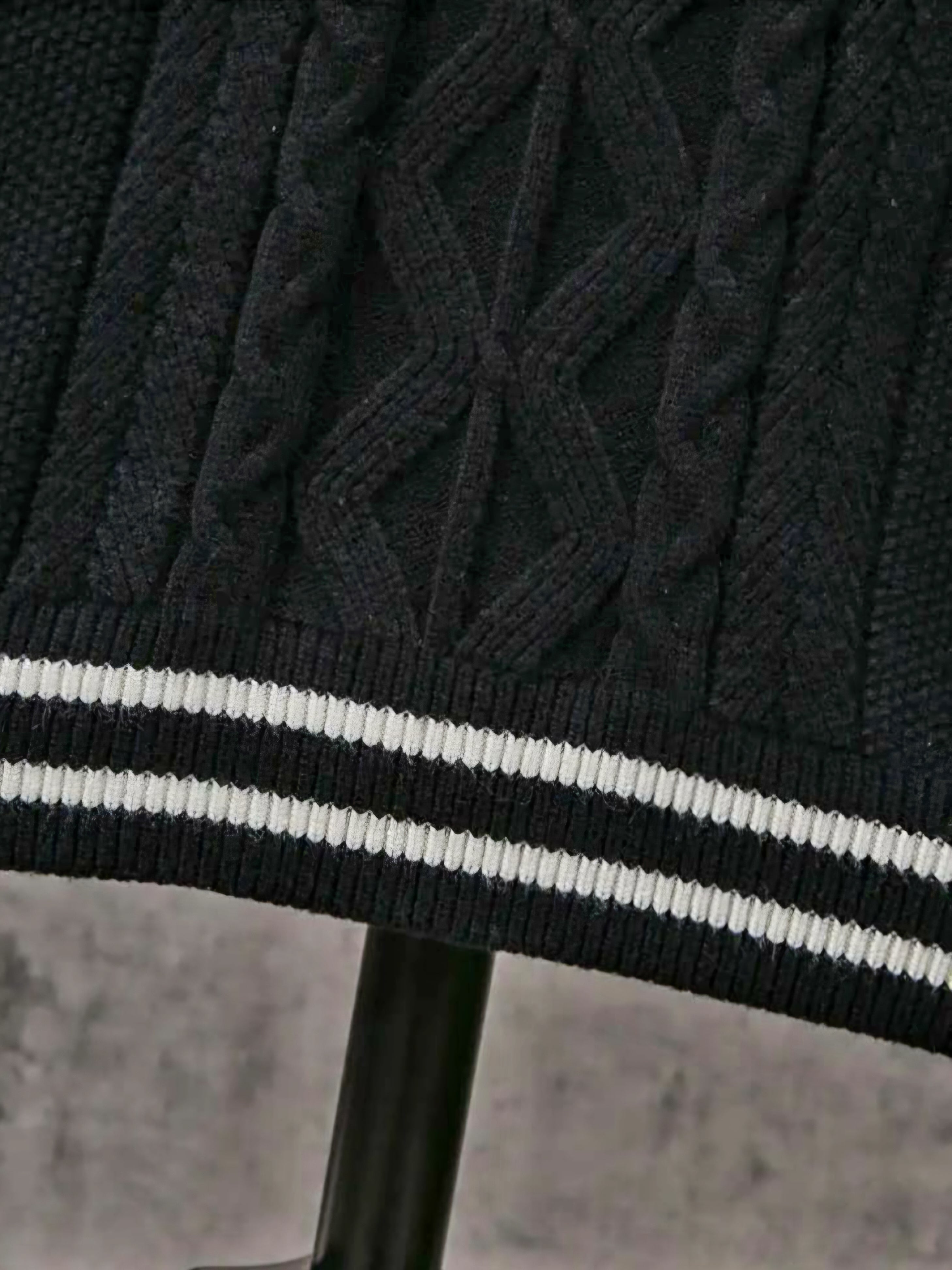 JerZarie Men's Sleeveless jumper in black with white starred logo